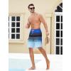 imageSILKWORLD Mens Swim Trunks with Compression Liner Quick Dry Bathing Suits 9 Inch Swimming Shorts with Cargo PocketsZ0 Gradient Black Blue Stripes