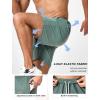 imageSILKWORLD Mens Quick Dry Athletic Running Shorts with Zipper Pockets 7quot Stretch Gym Workout Training ShortsLight Green